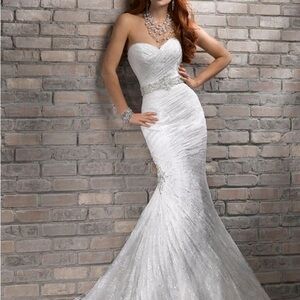 Maggie Sottero Arabella lace trumpet wedding gown
